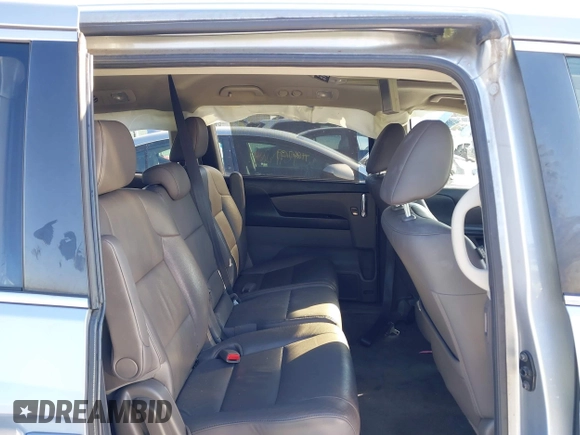 2017 Honda Odyssey EX-L with VIN 5FNRL5H6XHB003389, listed as a IAAI auction lot 41329731 with 203,368 mi miles and . Bid and sale history available at DreamBid. Image 8.