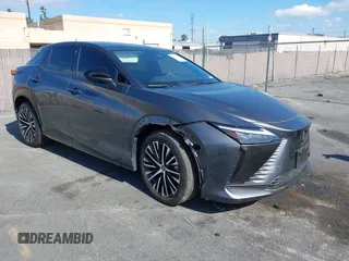 2023 Lexus RZ with VIN JTJAAAAB5PA011228, listed as a IAAI auction lot 41550311 with 6,984 mi miles. Bid and sale history available at carsss.com. Image 1.
