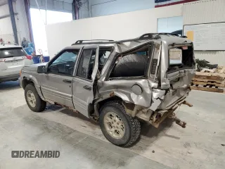 1997 Jeep Grand Cherokee Limited with VIN 1J4GZ78Y4VC589688, listed as a Copart auction lot 84673974 with 183,930 mi miles and Salvage Title. Bid and sale history available at carsss.com. Image 2.