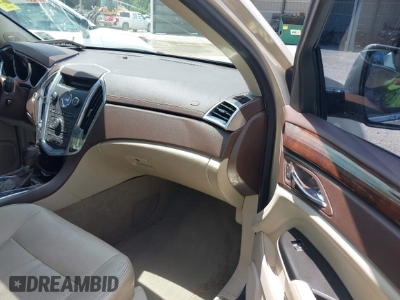 2012 Cadillac SRX Premium Collection with VIN 3GYFNCE30CS608477, listed as a IAAI auction lot 42120676 with 183,619 mi miles and . Bid and sale history available at DreamBid. Image 5.