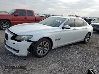 2011 BMW 7 Series 740Li with VIN WBAKB4C50BC392607, listed as a Copart auction lot 44201025 with 201,000 mi miles and Salvage Title. Bid and sale history available at carsss.com. Image 1.