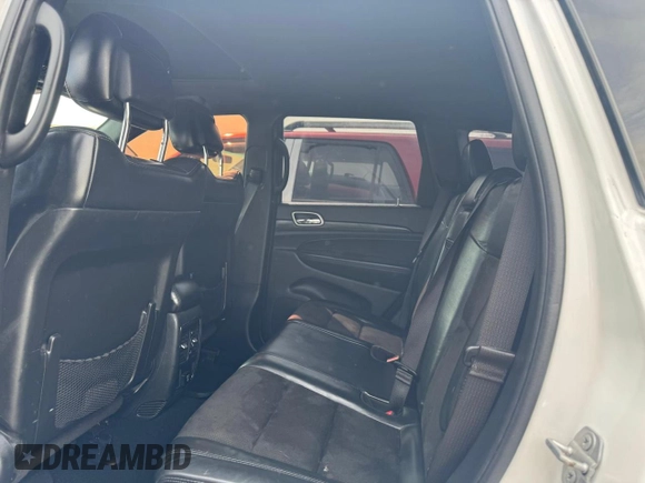 2019 Jeep Grand Cherokee Laredo E with VIN 1C4RJFAG8KC678774, listed as a Copart auction lot 52527475 with 156,592 mi miles and Clean Title. Bid and sale history available at carsss.com. Image 9.