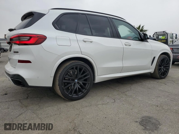 2020 BMW X5 M50i with VIN 5UXJU4C00LL228142, listed as a Copart auction lot 81246294 with 86,014 mi miles and Clean Title. Bid and sale history available at DreamBid. Image 3.