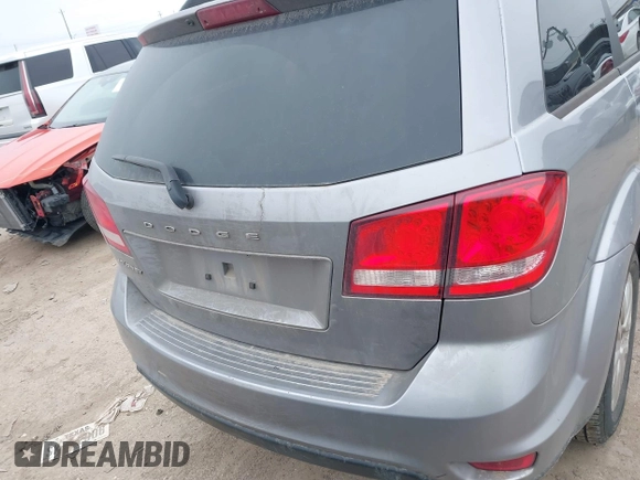 2019 Dodge Journey SE with VIN 3C4PDCBB0KT816103, listed as a IAAI auction lot 41640272 with 118,310 mi miles and . Bid and sale history available at DreamBid. Image 16.