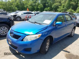 2009 Toyota Corolla with VIN JTDBL40E09J034871, listed as a IAAI auction lot 42402215 with 166,742 mi miles and . Bid and sale history available at DreamBid. Image 2.