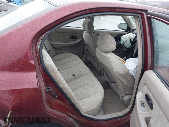 2001 Hyundai Elantra GLS z VIN KMHDN45D31U157064, wystawiony jako IAAI lot #41555447 z przebiegiem Nie podano mil oraz . Historia ofert i sprzedaży dostępna na DreamBid. Obrazek 8.