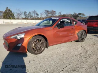 2014 Scion FR-S with VIN JF1ZNAA12E9706711, listed as a Copart auction lot 83640284 with 203,345 mi miles and Salvage Title. Bid and sale history available at DreamBid. Image 1.