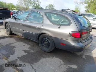 2003 Ford Taurus SE Standard with VIN 1FAFP58U63G117125, listed as a IAAI auction lot 42061812 with 172,154 mi miles. Bid and sale history available at carsss.com. Image 3.
