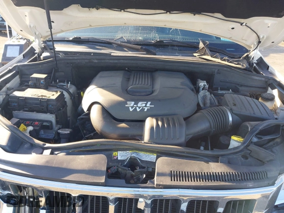 2012 Jeep Grand Cherokee Laredo with VIN 1C4RJFAG5CC310893, listed as a IAAI auction lot 41695279 with 136,821 mi miles. Bid and sale history available at carsss.com. Image 10.