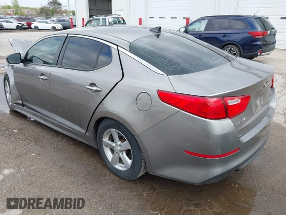 2015 Kia Optima LX z VIN 5XXGM4A78FG382856, wystawiony jako IAAI lot #42170669 z przebiegiem 101 964 mil mil oraz . Historia ofert i sprzedaży dostępna na DreamBid. Obrazek 3.
