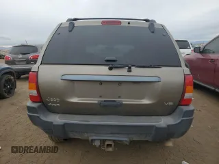 2004 Jeep Grand Cherokee Laredo with VIN 1J4GW48N94C408435, listed as a Copart auction lot 83909444 with Not provided miles and Clean title. Bid and sale history available at DreamBid. Image 6.