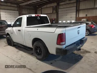 2014 Ram 1500 Express with VIN 3C6JR6AG7EG310097, listed as a IAAI auction lot 41409343 with 134,140 mi miles and . Bid and sale history available at DreamBid. Image 3.
