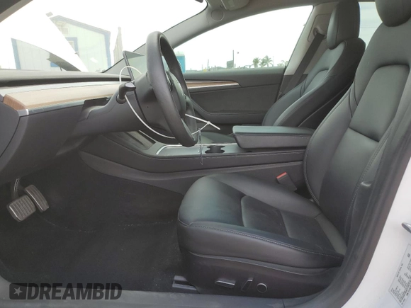 2022 Tesla Model 3 Long Range z VIN 5YJ3E1EB3NF174314, wystawiony jako Copart lot #52713325 z przebiegiem 27 646 mil mil oraz Szkoda całkowita • Salvage title. Historia ofert i sprzedaży dostępna na DreamBid. Obrazek 7.