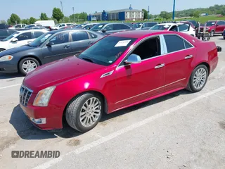 2012 Cadillac CTS Performance with VIN 1G6DJ5E31C0107905, listed as a IAAI auction lot 42131940 with 108,015 mi miles and . Bid and sale history available at DreamBid. Image 2.