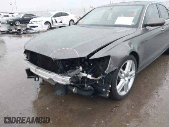 2014 Audi A6 Premium Plus z VIN WAUGFAFC3EN087176, wystawiony jako IAAI lot #42117602 z przebiegiem 53 571 mil mil oraz . Historia ofert i sprzedaży dostępna na DreamBid. Obrazek 6.
