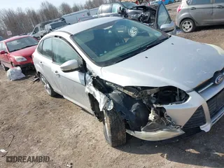 2013 Ford Focus SE with VIN 1FADP3F20DL174037, listed as a IAAI auction lot 41792552 with 131,984 mi miles. Bid and sale history available at carsss.com. Image 6.