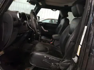 2014 Jeep Wrangler Unlimited Sahara с VIN 1C4BJWEG5EL255926, выставлен на аукционе Copart как лот 57759065 с пробегом 199 877 миль миль и Чистый • Clean title. История ставок и продаж доступна на DreamBid. Изображение 7.