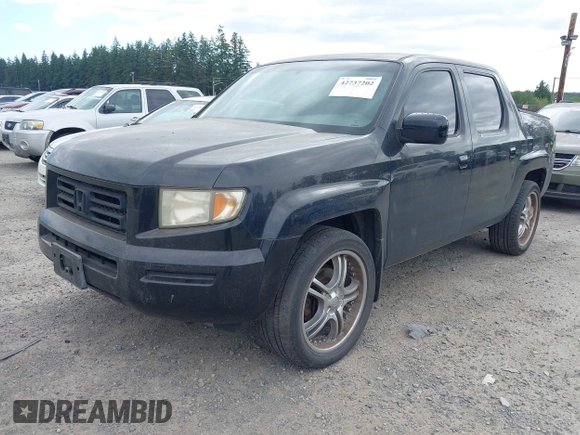2006 Honda Ridgeline RTL with VIN 2HJYK16526H517466, listed as a IAAI auction lot 42737202 with 184,856 mi miles and . Bid and sale history available at DreamBid. Image 2.