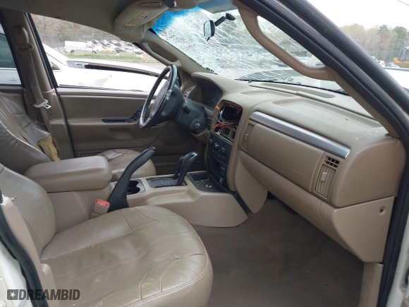 2003 Jeep Grand Cherokee Laredo with VIN 1J4GW48S33C521253, listed as a IAAI auction lot 41929756 with 209,686 mi miles. Bid and sale history available at carsss.com. Image 5.