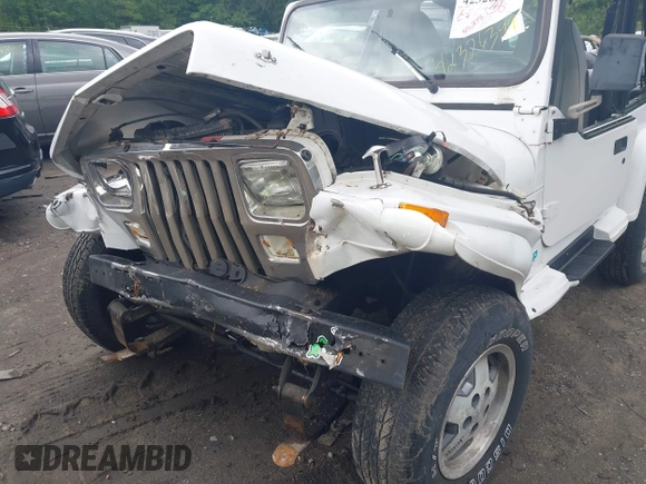 1995 Jeep Wrangler z VIN 1J4FY29S1SP206760, wystawiony jako IAAI lot #42326399 z przebiegiem 55 278 mil mil oraz . Historia ofert i sprzedaży dostępna na DreamBid. Obrazek 6.