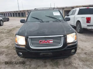 2006 GMC Envoy SLT with VIN 1GKDS13S462241866, listed as a IAAI auction lot 41943322 with 90,695 mi miles. Bid and sale history available at carsss.com. Image 6.