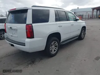 2017 Chevrolet Tahoe LT with VIN 1GNSCBKC0HR238478, listed as a IAAI auction lot 41566679 with 161,086 mi miles. Bid and sale history available at carsss.com. Image 4.
