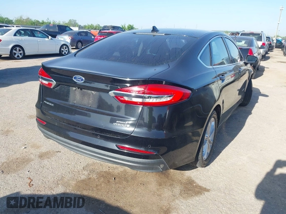 2019 Ford Fusion SEL with VIN 3FA6P0MU5KR203851, listed as a IAAI auction lot 41982637 with 96,954 mi miles and . Bid and sale history available at DreamBid. Image 4.