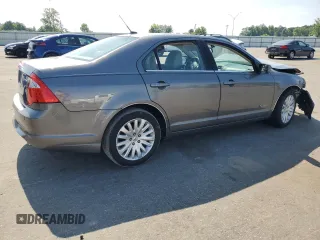 2010 Ford Fusion Hybrid z VIN 3FADP0L33AR267806, wystawiony jako Copart lot #55952815 z przebiegiem 146 912 mil mil oraz Szkoda całkowita • Salvage title. Historia ofert i sprzedaży dostępna na DreamBid. Obrazek 3.