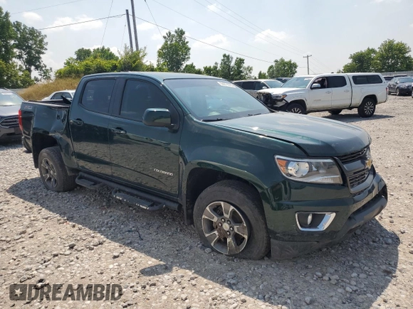 2015 Chevrolet Colorado 4WD Z71 with VIN 1GCGTCE35F1149677, listed as a Copart auction lot 64271015 with 39,671 mi miles and Clean title. Bid and sale history available at DreamBid. Image 4.