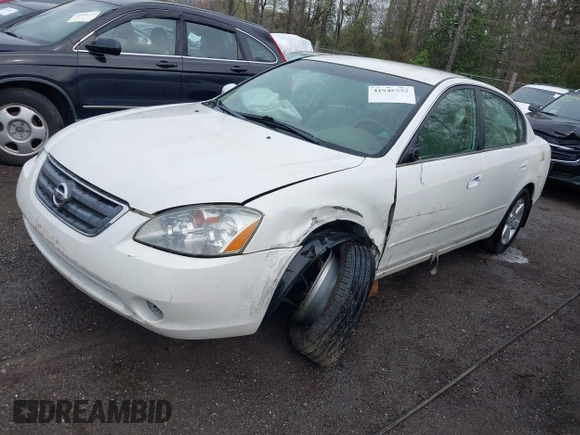 2002 Nissan Altima S with VIN 1N4AL11D72C138368, listed as a IAAI auction lot 41948552 with 242,060 mi miles. Bid and sale history available at carsss.com. Image 2.