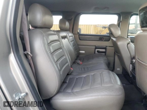 2003 Hummer H2 with VIN 5GRGN23U33H124696, listed as a Copart auction lot 79452004 with 154,144 mi miles and Salvage Title. Bid and sale history available at carsss.com. Image 11.