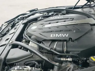 2015 BMW 6 Series 650i xDrive z VIN WBA6B4C50FD761614, wystawiony jako IAAI lot #41647272 z przebiegiem 106 100 mil mil oraz . Historia ofert i sprzedaży dostępna na DreamBid. Obrazek 19.