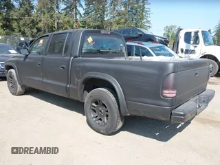 2004 Dodge Dakota SLT with VIN 1D7HL48N44S671513, listed as a IAAI auction lot 42098169 with 189,177 mi miles. Bid and sale history available at carsss.com. Image 3.