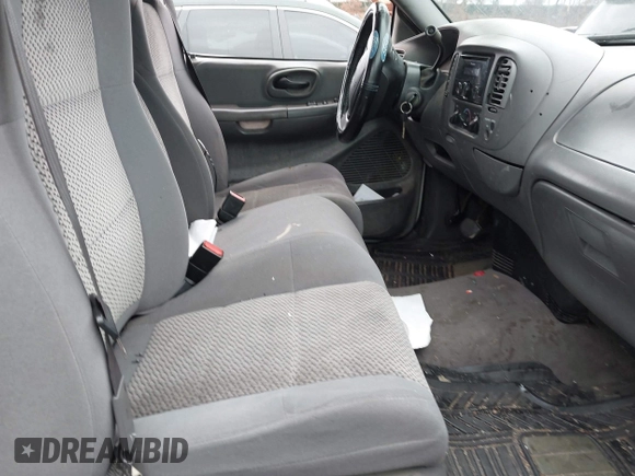2003 Ford F-150 XL with VIN 1FTRX17W73NA42322, listed as a IAAI auction lot 41680100 with 129,295 mi miles. Bid and sale history available at carsss.com. Image 5.
