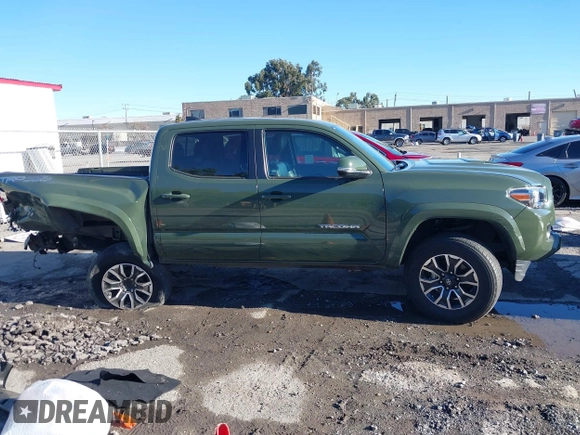 2021 Toyota Tacoma SR with VIN 3TMCZ5AN7MM395940, listed as a IAAI auction lot 41240832 with 39,338 mi miles and . Bid and sale history available at DreamBid. Image 13.