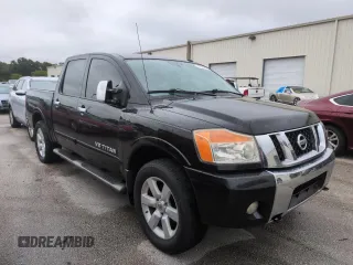 2010 Nissan Titan LE with VIN 1N6BA0EC8AN318538, listed as a Copart auction lot 74122194 with Not Provided miles and Salvage Title. Bid and sale history available at carsss.com. Image 4.