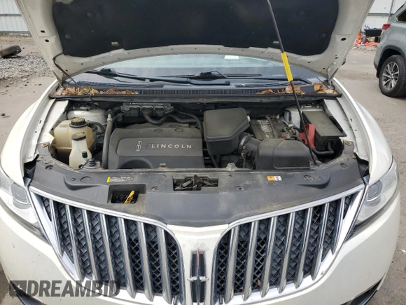 2013 Lincoln MKX with VIN 2LMDJ8JK0DBL06312, listed as a Copart auction lot 54804854 with 121,107 mi miles and Salvage Title. Bid and sale history available at DreamBid. Image 13.