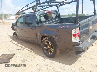 2017 Chevrolet Colorado 4WD WT with VIN 1GCGTBEN5H1309829, listed as a IAAI auction lot 42520059 with 261,085 mi miles and . Bid and sale history available at DreamBid. Image 3.