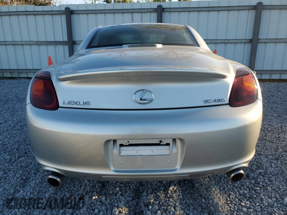 2003 Lexus SC 430 z VIN JTHFN48Y830043145, wystawiony jako Copart lot #88215605 z przebiegiem Nie podano mil oraz Nie do naprawy. Historia ofert i sprzedaży dostępna na DreamBid. Obrazek 6.