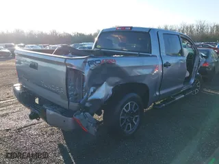 2019 Toyota Tundra 4WD SR5 with VIN 5TFDY5F17KX825602, listed as a IAAI auction lot 41368794 with 39,486 mi miles. Bid and sale history available at carsss.com. Image 4.