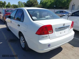 2001 Honda Civic LX with VIN 2HGES16551H602691, listed as a IAAI auction lot 42039179 with 139,615 mi miles. Bid and sale history available at carsss.com. Image 3.