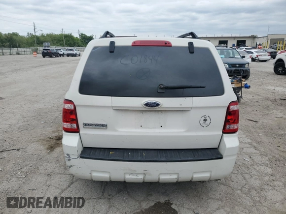 2009 Ford Escape Hybrid with VIN 1FMCU493X9KC01844, listed as a Copart auction lot 58220035 with Not provided miles and Salvage title. Bid and sale history available at DreamBid. Image 6.