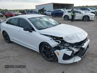 2022 Kia K5 GT-Line z VIN 5XXG64J26NG105409, wystawiony jako IAAI lot #41916144 z przebiegiem 104 031 mil mil oraz . Historia ofert i sprzedaży dostępna na DreamBid. Obrazek 1.