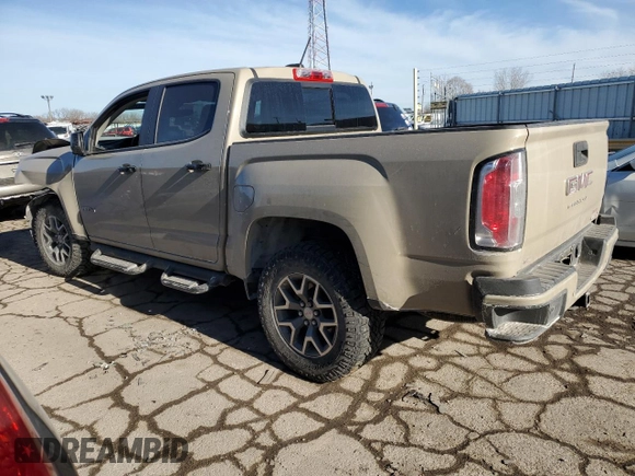 2022 GMC Canyon 4WD AT4 w/Leather with VIN 1GTG6FEN2N1157017, listed as a Copart auction lot 42788605 with 32,317 mi miles and Salvage Title. Bid and sale history available at carsss.com. Image 2.