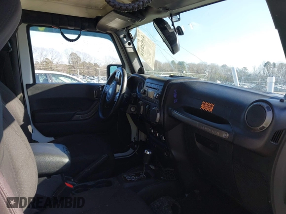 2014 Jeep Wrangler Sport with VIN 1C4AJWAG0EL245337, listed as a IAAI auction lot 41532314 with 140,721 mi miles and . Bid and sale history available at DreamBid. Image 5.