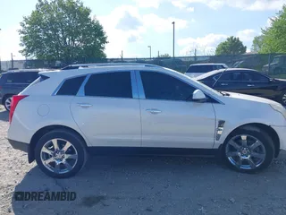 2011 Cadillac SRX Performance Collection z VIN 3GYFNBEYXBS543819, wystawiony jako IAAI lot #42159051 z przebiegiem Nie podano mil oraz . Historia ofert i sprzedaży dostępna na DreamBid. Obrazek 14.