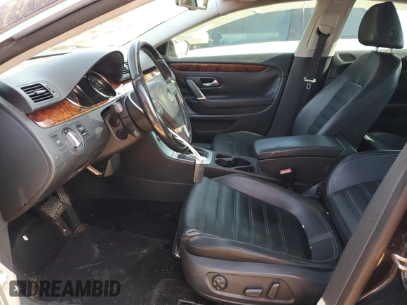 2011 Volkswagen CC Lux Plus with VIN WVWHN7AN4BE703226, listed as a Copart auction lot 52021595 with 132,242 mi miles and Salvage Title. Bid and sale history available at carsss.com. Image 7.