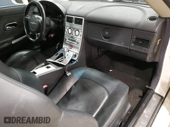 2004 Chrysler Crossfire с VIN 1C3AN69L64X009535, выставлен на аукционе Copart как лот 51344405 с пробегом Не указан миль и На запчасти • Non repairable. История ставок и продаж доступна на DreamBid. Изображение 8.