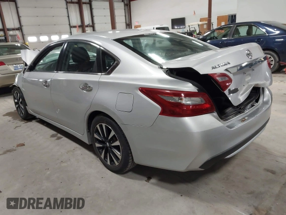 2018 Nissan Altima SR with VIN 1N4AL3AP0JC266584, listed as a IAAI auction lot 41900484 with 136,223 mi miles and . Bid and sale history available at carsss.com. Image 3.