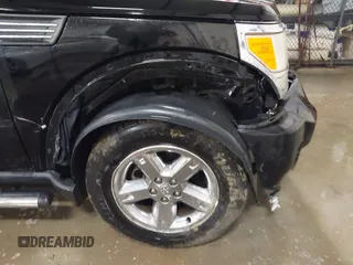 2007 Dodge Nitro SLT with VIN 1D8GT58K77W724530, listed as a IAAI auction lot 41499022 with 214,183 mi miles. Bid and sale history available at carsss.com. Image 6.